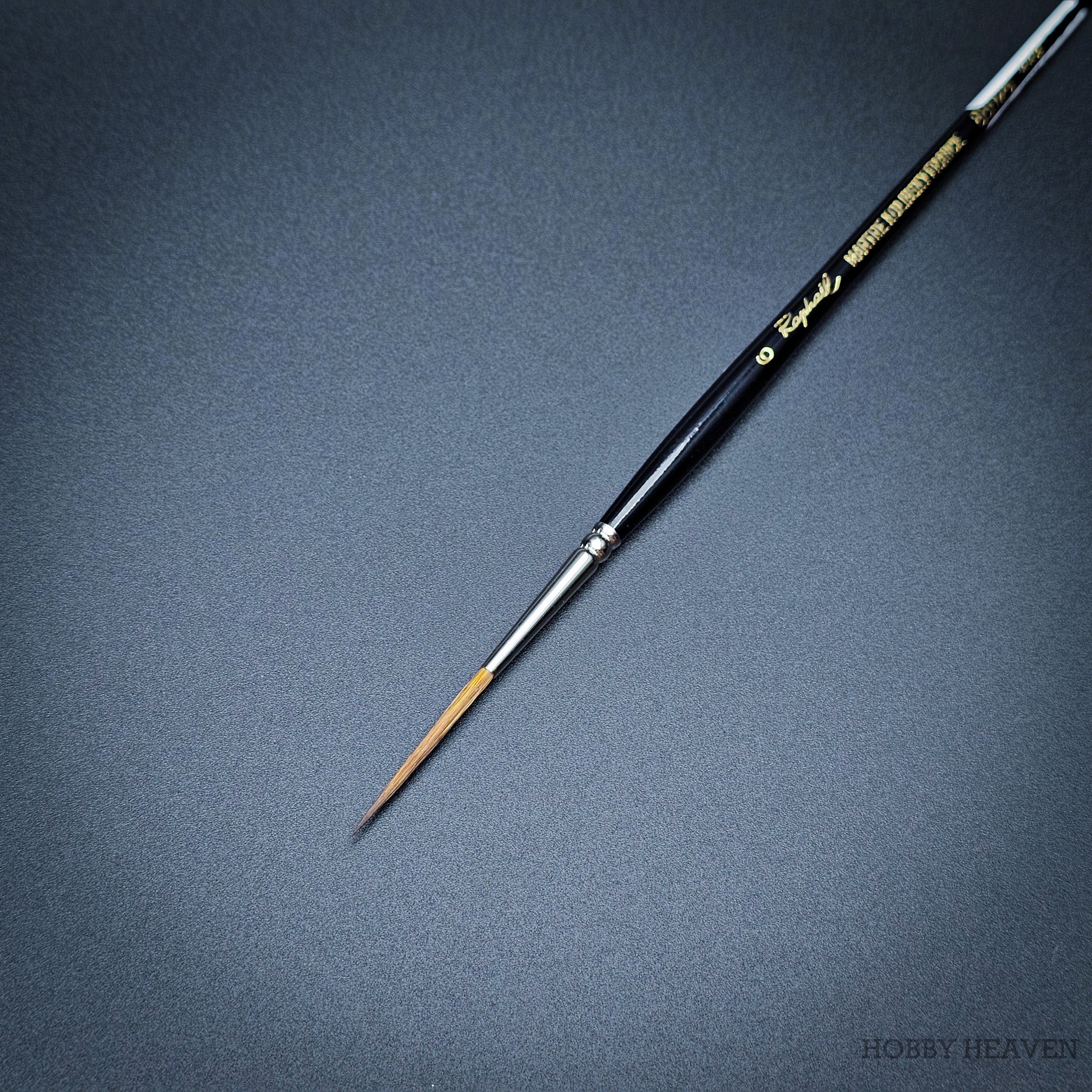 Raphael Kolinsky Sable Brush 88026 – Close-up of size 6, fine detail long tip liner on black background.