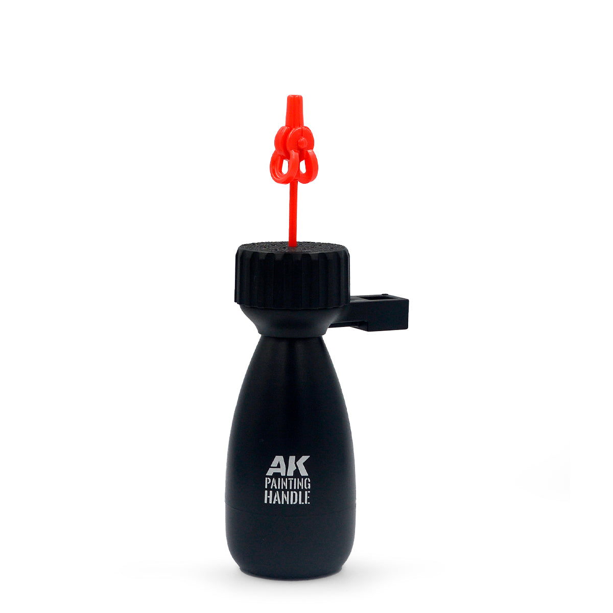Single red AK Interactive holding pin inserted into the rotating platform of the AK9565 Handle Support showing the clip-top protruding above the textured base ready for mounting a miniature part