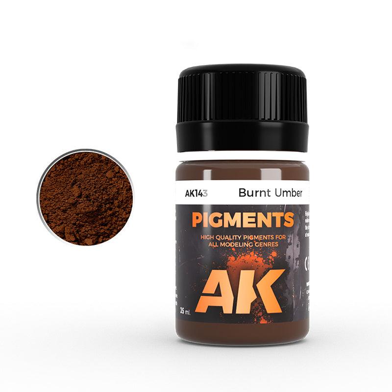 AK143 Burnt Umber: 35 ml AK PIGMENTS jar with a black screw cap, beside a swatch of warm dark brown powder