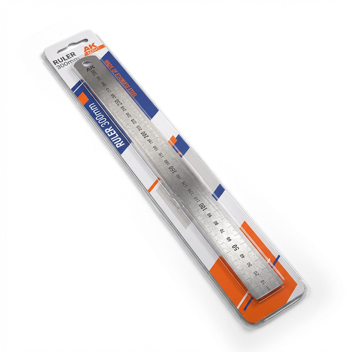 AK Interactive AK9547 Steel Ruler 300mm in retail blister packaging shown at angle with studio lighting highlighting stainless steel construction and metric scale