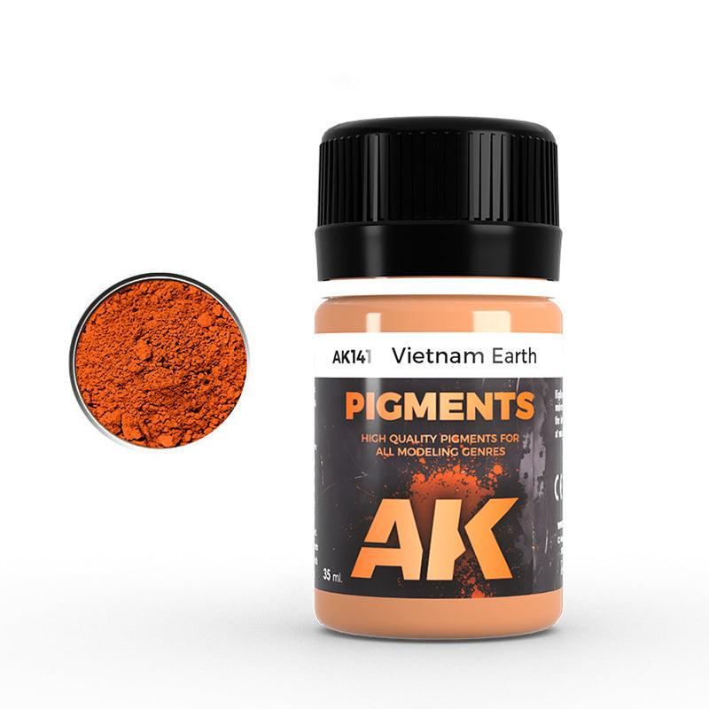 AK141 Vietnam Earth: 35 ml AK PIGMENTS jar with a black screw cap, beside a swatch of reddish-brown earth-toned powder