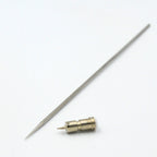 AK Interactive 0.2mm replacement parts showing full-length stainless steel needle with precision-ground taper and brass self-centering nozzle with visible orifice and stepped collar on white background