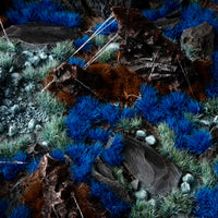 Fantastical diorama featuring Alien Blue 6mm - Wild Tufts, showcasing an alien landscape or underwater scene with vibrant blue vegetation and coral-like structures
