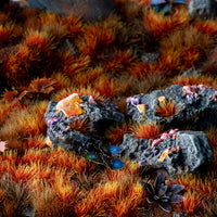 Dynamic diorama featuring Alien Fire Tuft 6mm - Wild, showcasing a fiery alien landscape or vibrant underwater scene with intense orange, flame-like vegetation
