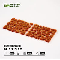 Sheet of 70 Alien Fire Tuft 6mm - Wild, displaying variety of shapes and sizes of bright orange, flame-like alien vegetation tufts
