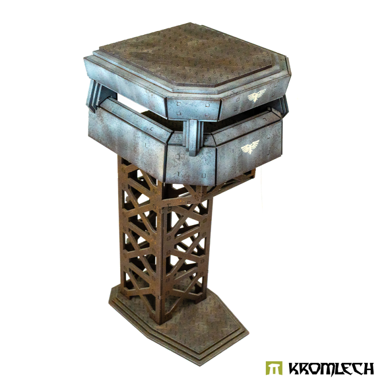 The painted sentry tower from another side, eagle badge on the cabin wall
