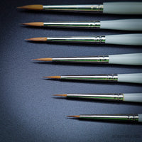 Close-up of Artis Opus S Series Kolinsky Sable Brush range displayed on black background, sizes S00 to S4
