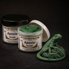 Aves Apoxie Sculpt 1lb Green — Part A tub open showing green putty, Part B tub behind, with a detailed sculpted iguana figure demonstrating the material's fine detail capability
