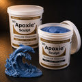 Aves Apoxie Sculpt 4lb Blue — large Part A and Part B tubs with blue putty visible, alongside a detailed sculpted dolphin leaping from a cresting ocean wave