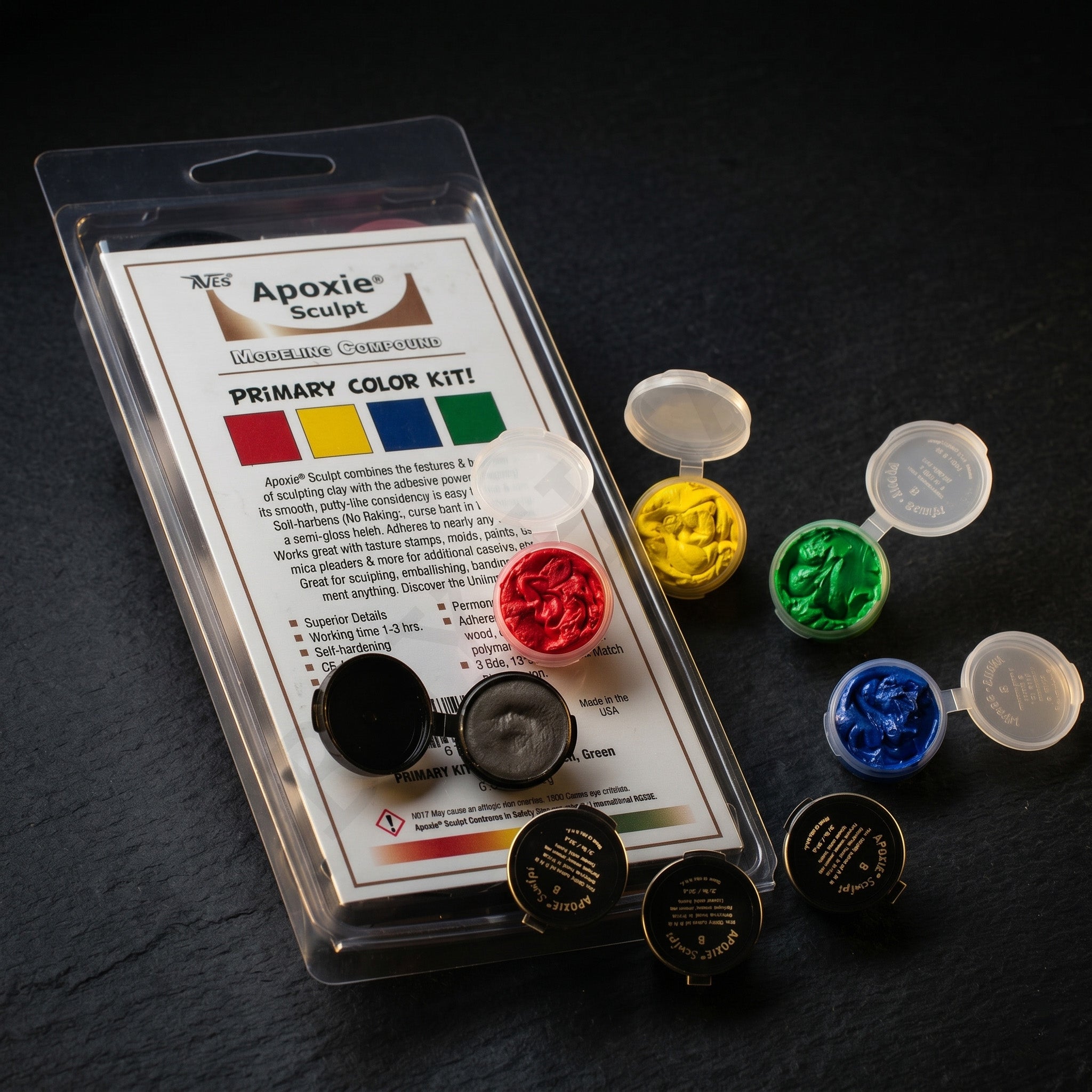 Aves Apoxie Sculpt Primary Colour Kit with retail blister pack and open sample pods in red, yellow, blue and green for colour mixing and sculpting