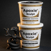 Aves Studio Apoxie Sculpt Black 4 lb with Part A and Part B tubs beside a black serpent sculpture
