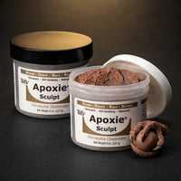 Aves Studio Apoxie Sculpt Brown 1 lb with Part A and Part B jars beside a brown dragon egg sculpture
