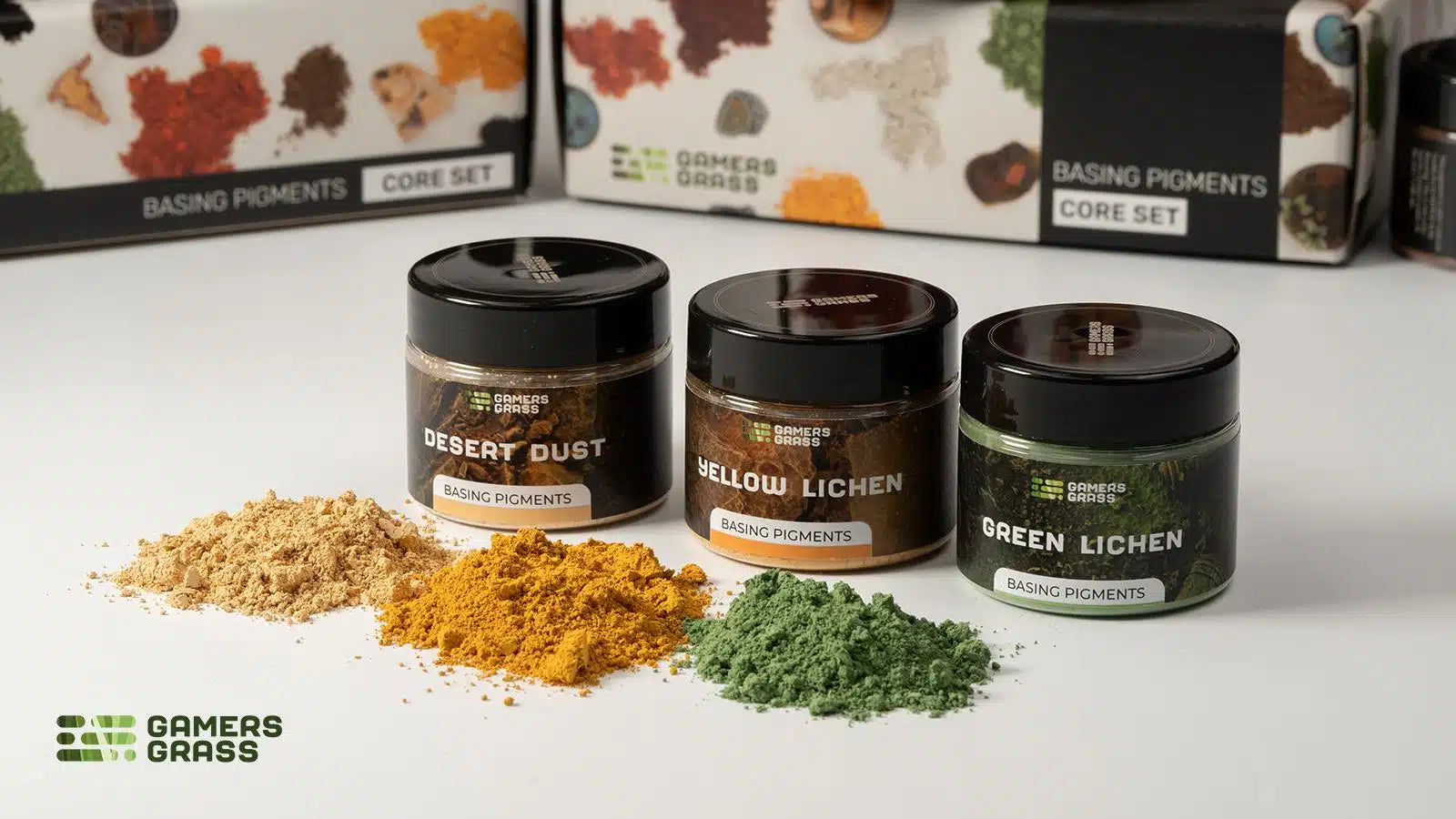 A selection of 3 different colored dry pigments for basing and weathering miniatures.