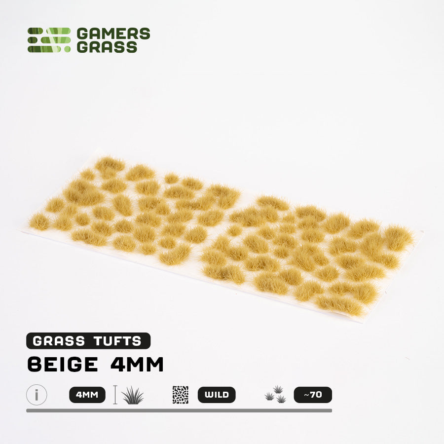 Sheet of 70 Beige 4mm - Wild Tufts, displaying various shapes and sizes of light beige grass tufts ready for dry terrain applications