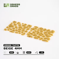 Sheet of 70 Beige 4mm - Wild Tufts, displaying various shapes and sizes of light beige grass tufts ready for dry terrain applications
