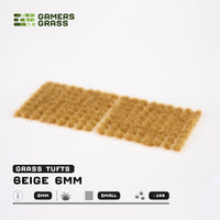 Sheet of 144 Beige 6mm Small Tufts, showcasing various shapes and sizes of realistic dry grass tufts ready for application
