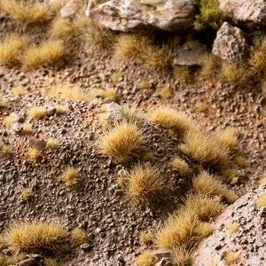 Arid landscape diorama featuring Beige 6mm Wild Tufts, showcasing realistic dry vegetation in a desert or steppe scene