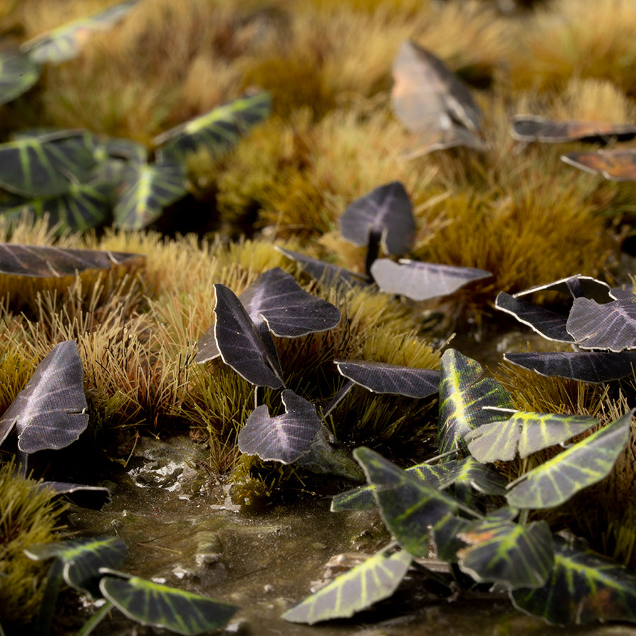 Dark, mysterious tropical diorama featuring Laser Plants Black Magic Taro, showcasing landscape with  enigmatic purple-black foliage
