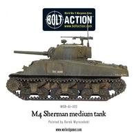 Painted M4 Sherman Medium Tank in action during Bolt Action WWII game
