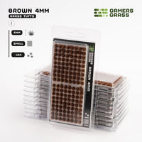 Gamers Grass Brown 4mm - Small Tufts packaging, showcasing desert scenery and alien landscape imagery
