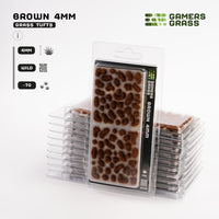 Gamers Grass Brown 4mm - Wild Tufts packaging, showcasing desert scenery and alien landscape imagery
