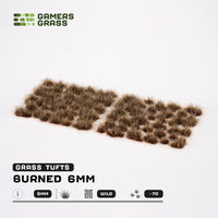 Sheet of 70 Burned Tufts 6mm - Wild, displaying various shapes and sizes of realistic charred grass tufts with beige tips and dark bases
