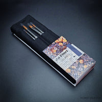 Da Vinci Colineo 4068 brush set angled view with black cotton bag on black background
