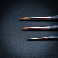 Close-up of Da Vinci Colineo Secret Places synthetic brush tips on black background
