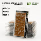 Gamers Grass Copper Brown 2mm tufts packaging, featuring dreamlike landscape imagery and product details