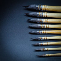 Close-up photo of Da Vinci Series 418 squirrel wash brushes with natural hair oval mop tips
