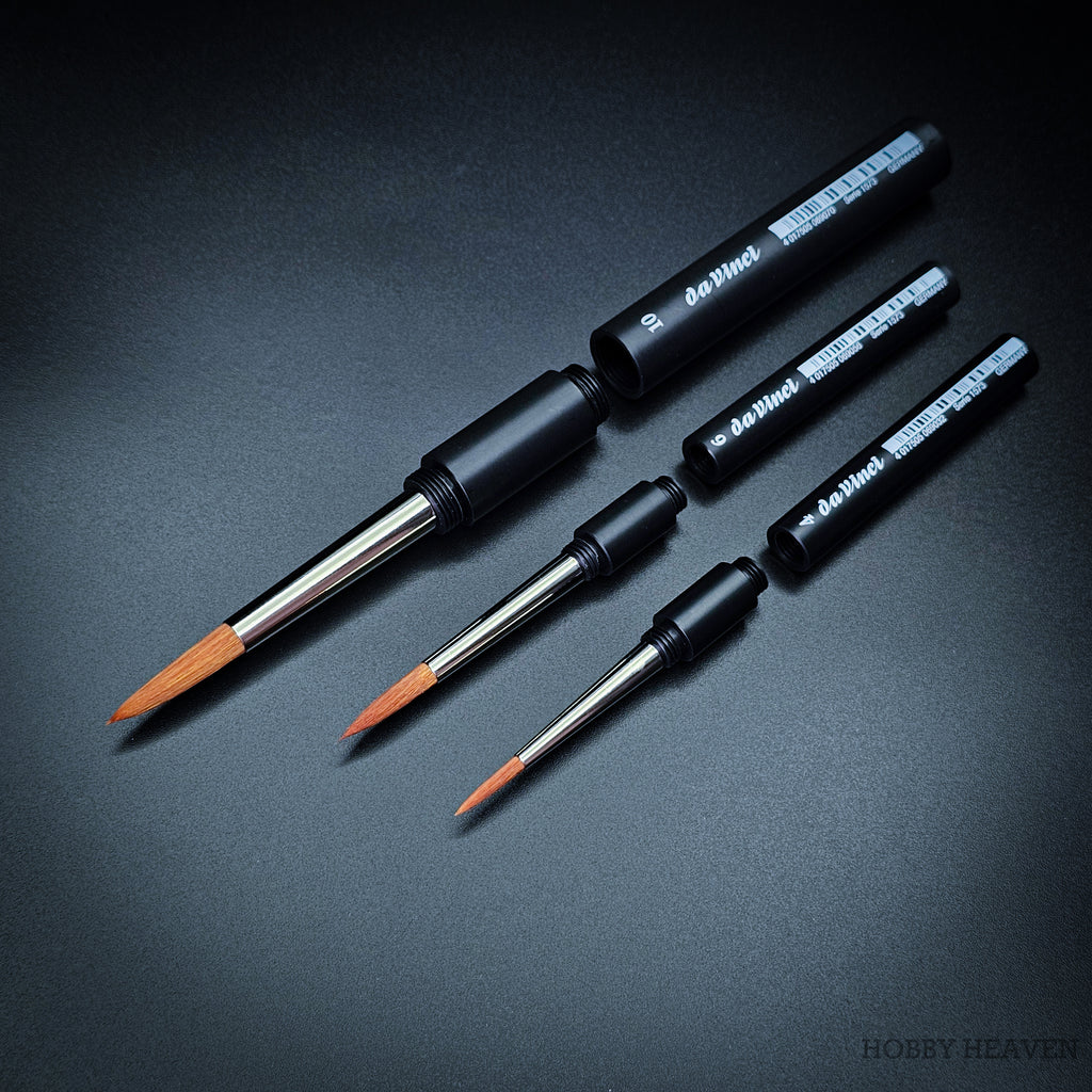 da Vinci Cosmotop-Spin travel brushes with protective handle caps removed to show compact design