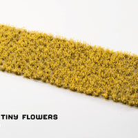 Close-up sheet of Gamers Grass Dandelion Tiny Flowers tufts, 4mm yellow blossoms