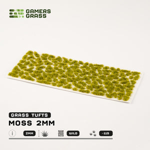 Sheet of 115 Dark Moss 2mm tufts, showcasing various shapes and sizes of realistic, deep green moss ready for application