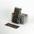 Set of laser-cut Dry Bracken fern leaves, displaying various sizes and autumnal brown shades in protective packaging