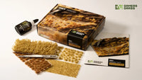 Gamers Grass Dry Grass Tuft Starter Box packaging, featuring arid landscape imagery and kit contents
