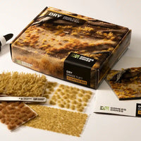 Gamers Grass Dry Grass Tuft Starter Box packaging, featuring arid landscape imagery and kit contents