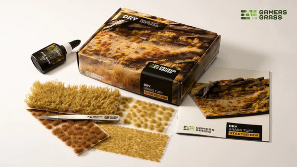 Gamers Grass Dry Grass Tuft Starter Box packaging, featuring arid landscape imagery and kit contents