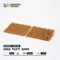 Sheet of 144 Dry Tuft 6mm - Small Tufts, displaying various shapes and sizes of realistic brownish/yellowish grass tufts ready for application
