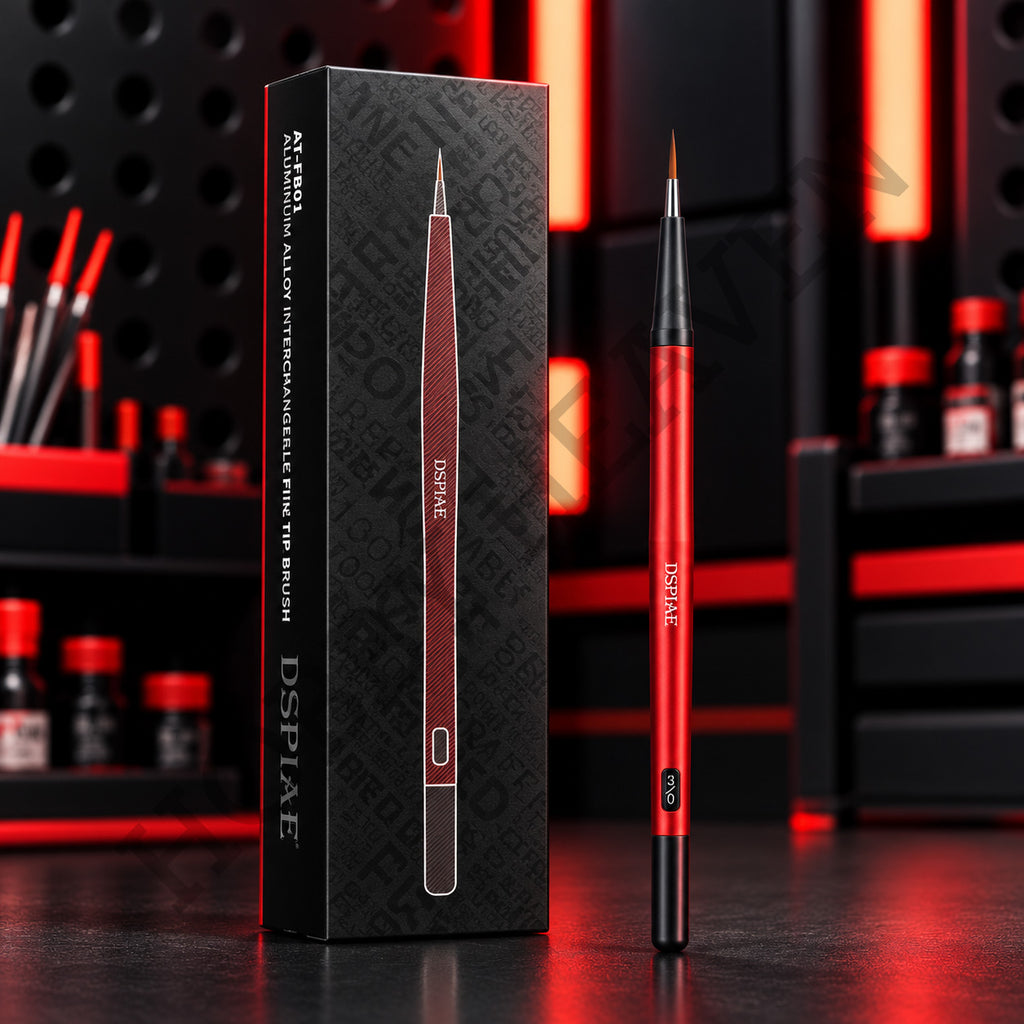 DSPIAE AT-FB01 red aluminium fine tip brush beside its black box, on a dark red-lit bench