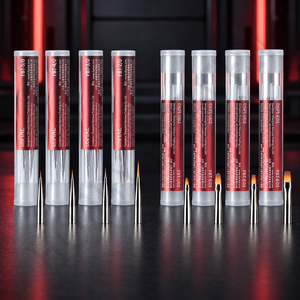 DSPIAE FBT brush tip tubes, four detail packs and four broad packs, standing on a dark bench
