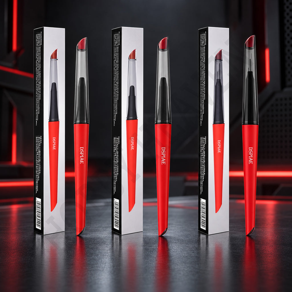 Three DSPIAE Phoenix Plume handles, red with clear caps, standing beside their boxes on a red-lit desk