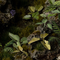 Lush tropical diorama featuring Laser Plants Elephant Ear leaves, showcasing a dense jungle scene with exotic landscape
