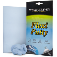 Flexi Putty blue 75g hobby grade reusable adhesive putty block next to product packaging
