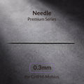 Gaahleri 0.3mm airbrush needle for Premium Series Mobius full length on dark textured surface with studio lighting
