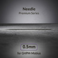 Gaahleri 0.5mm airbrush needle for Premium Series Mobius lying on textured surface with studio lighting
