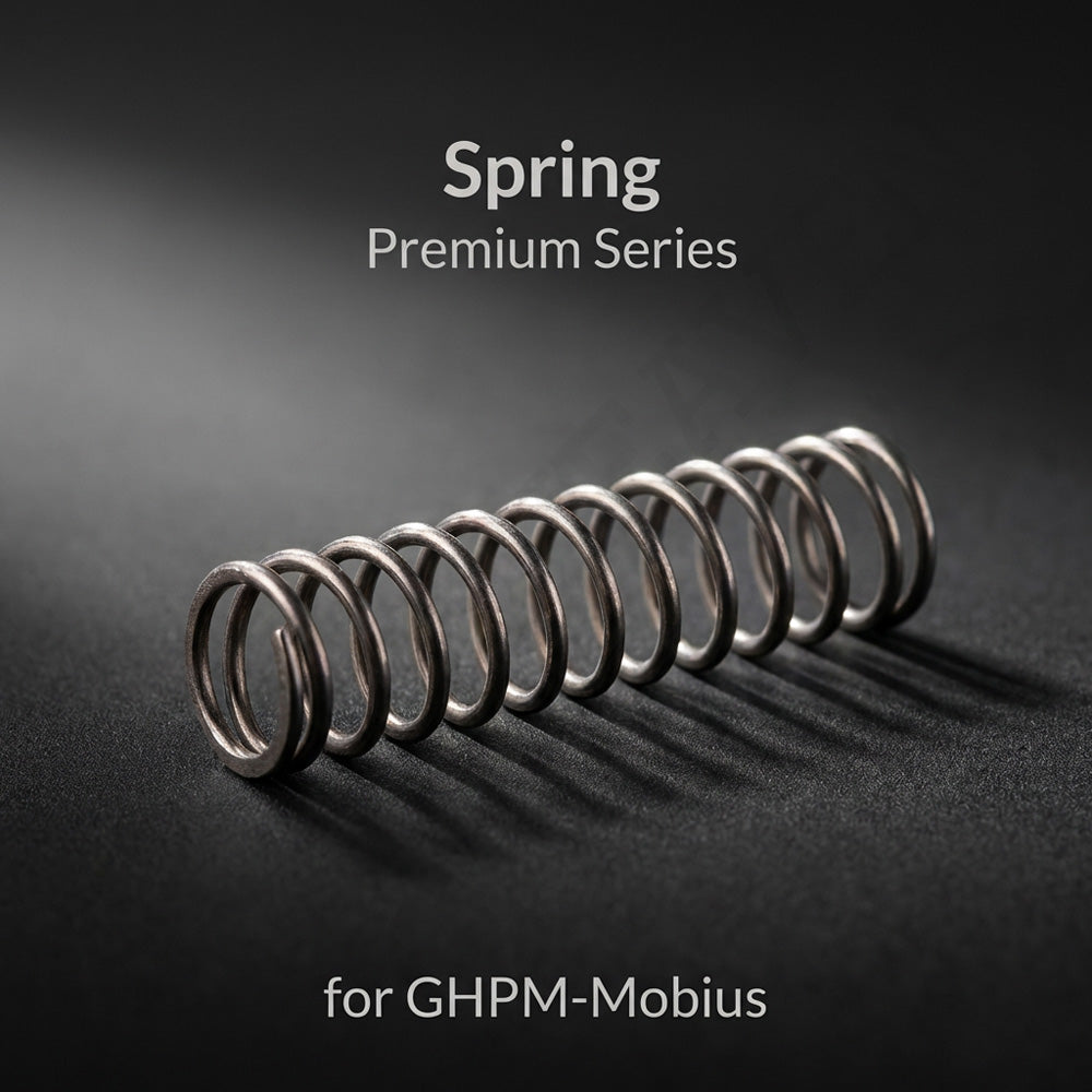 Gaahleri replacement trigger spring for Premium Series Mobius airbrush close-up on dark textured surface
