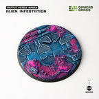 The painted 100mm Alien Infestation base from above: hexagonal deck panels ringed by magenta growth and pink tufts