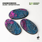 Three painted 75mm Alien Infestation oval bases from above, deck panels and grating under magenta growth
