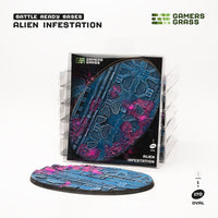 Gamers Grass packaging and colossal 170mm oval Alien Infestation base displayed on white background

