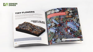 Gamers Grass Flowers Core Set booklet open showing tiny flower tufts examples